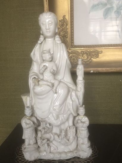 CHINA, 20th century
Guanyin with child in...