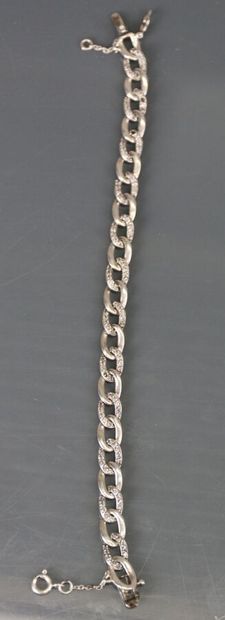 Set of silver jewelry including: a line brooch...