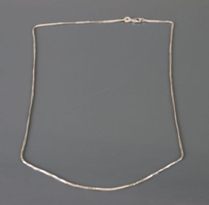 Set of silver jewelry including: a line brooch...