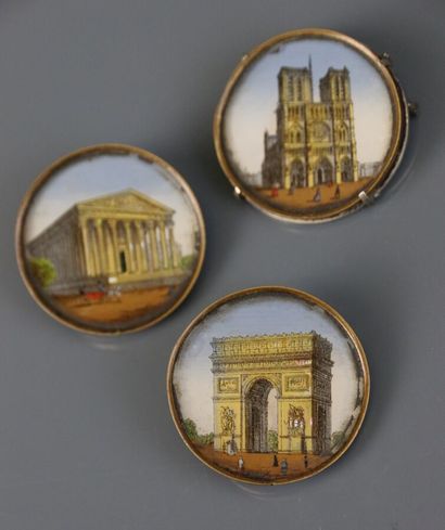 Three brooch-mounted medals decorated with...
