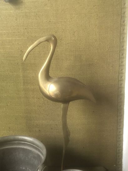 Set comprising: a pewter vase decorated with...