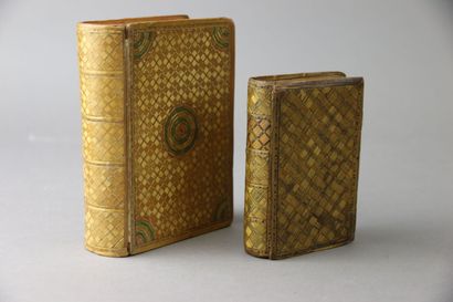 Two book-shaped ladies' work boxes in polychrome...