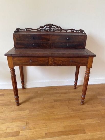 Mahogany-veneered desk with four drawers,...