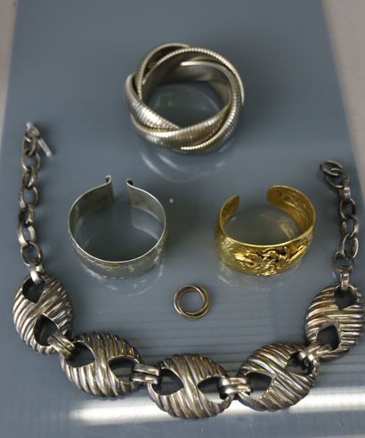 Lot of costume jewelry including metal bangle...