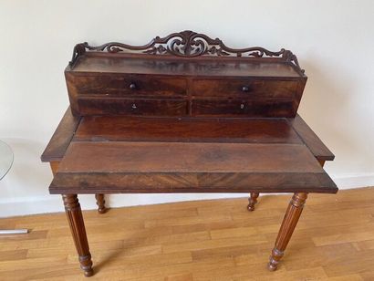 Mahogany-veneered desk with four drawers,...