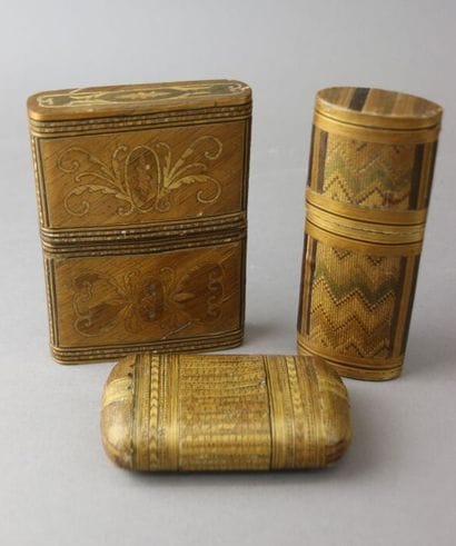 Two straw marquetry cases and a cigar holder...