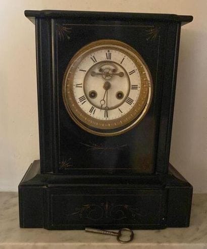 Boundary clock in black and breccia marble.
Late...