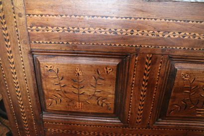 Large chestnut chest with four panels inlaid...