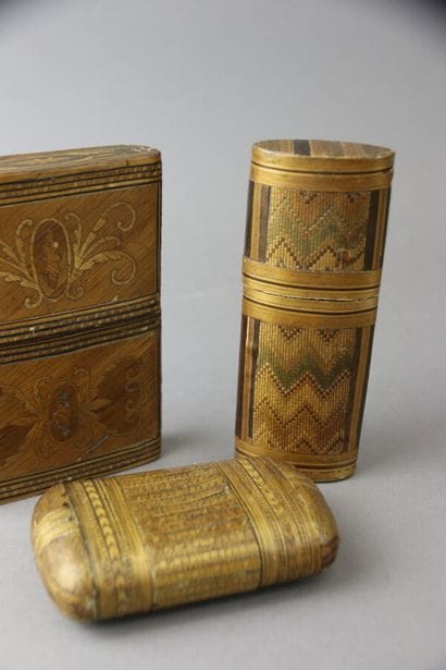 Two straw marquetry cases and a cigar holder...