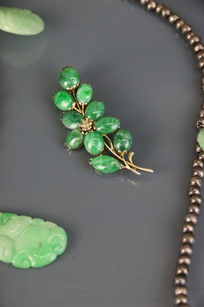 Necklace with silver beads holding engraved...