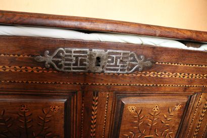Large chestnut chest with four panels inlaid...