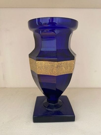 MOSER
Blue-tinted glass baluster vase decorated...