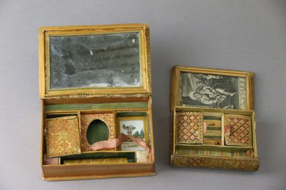 Two book-shaped ladies' work boxes in polychrome...