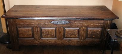 Large chestnut chest with four panels inlaid...