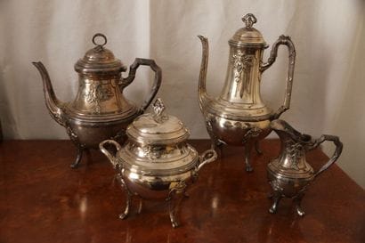 Four-piece tea set in 950°/°° silver decorated...