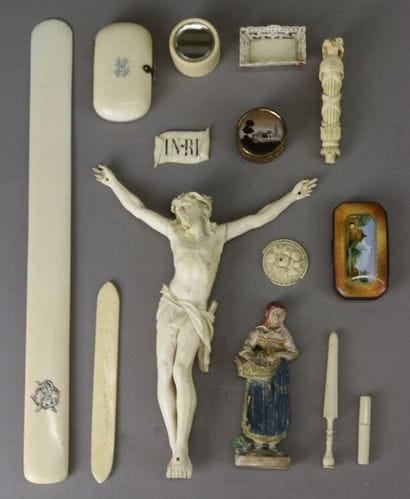 Set in marine ivory comprising: carved Christ...
