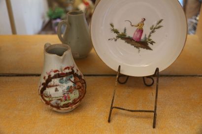 Porcelain milk jug with in-reserve decoration...