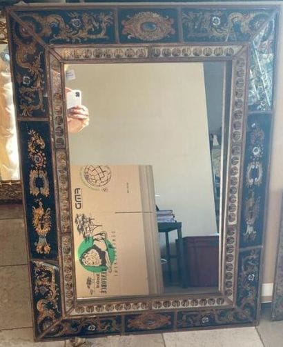 Upside-down mirror with polychrome flowers...