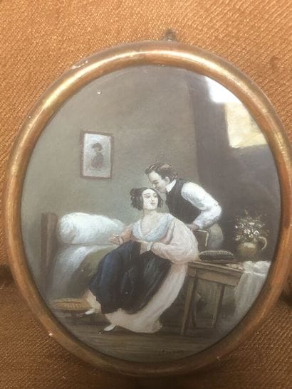 Three profile miniatures of a man and a woman....