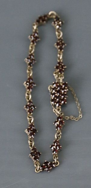 Set of silver jewelry including: a line brooch...