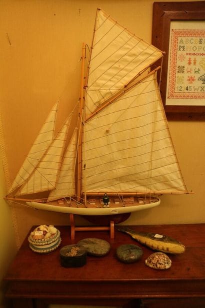 Set of display items including: a sailboat...