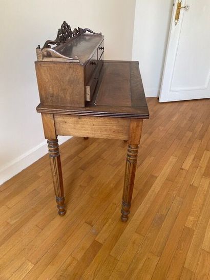 Mahogany-veneered desk with four drawers,...