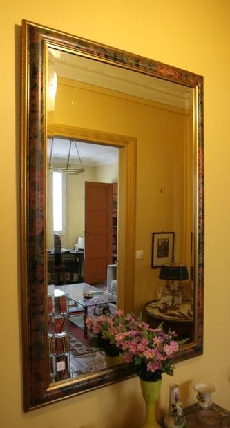 Mirror, molded frame painted with flowers....