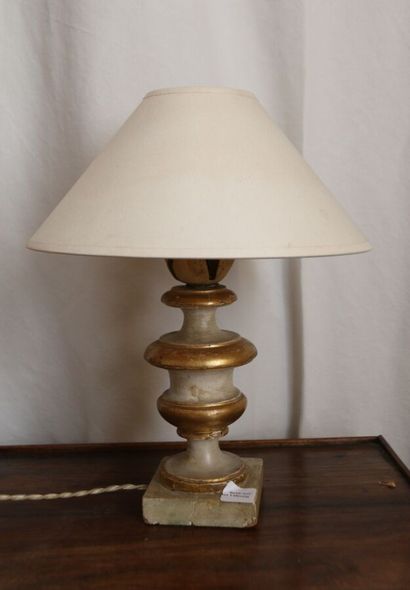 Church candlestick mounted as a lamp in carved...