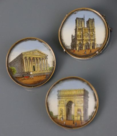 Three brooch-mounted medals decorated with...