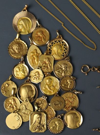 Gold-plated metal set including: 23 religious...