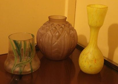 Purple-tinted molded glass ovoid vase decorated...