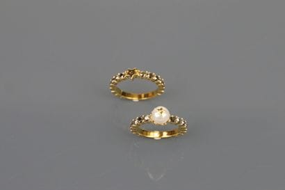 DIOR
Two gold-plated rings set with faceted...