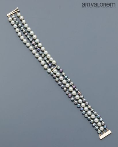 Three-row bracelet of dark and light gray...