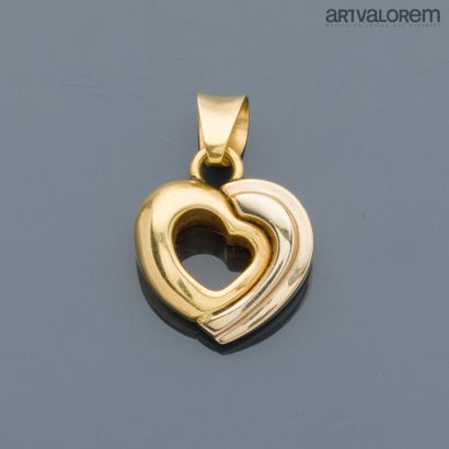 Stylized heart pendant in yellow gold 750°/°°,...