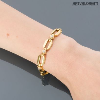 Bracelet in yellow gold 750°/°° articulated...