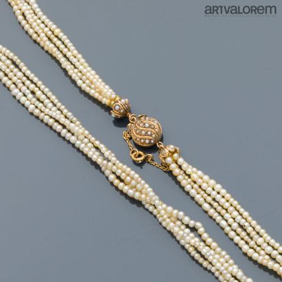 Necklace composed of four rows of round and...
