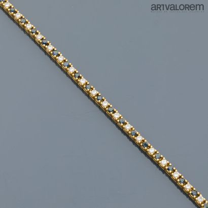 Line bracelet in 750°/°° yellow gold set...