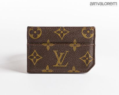 LOUIS VUITTON
Monogrammed canvas and brown...