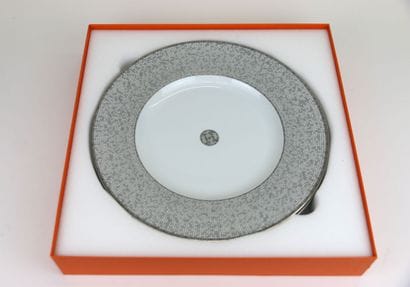 HERMÈS Paris
Two porcelain dinner plates,...