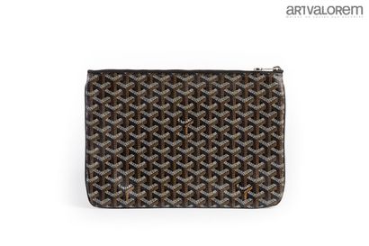 GOYARD
Coated canvas pouch with black background
Yellow...