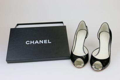 CHANEL
Pair of black patent pumps, open toe....