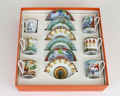 HERMÈS Paris
Box containing six litron-shaped...