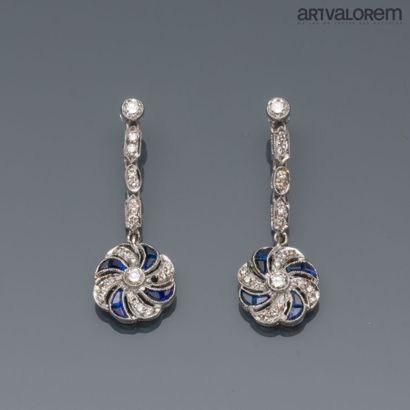 Pair of pierced earrings in 750°/°° white...