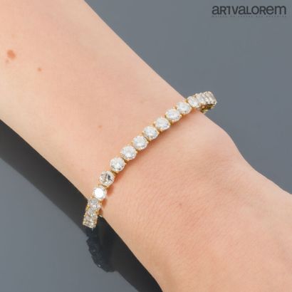 River bracelet in 750°/°° yellow gold adorned...