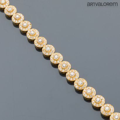 Bracelet in yellow gold 750°/°° with circular...