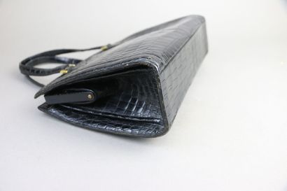 HERMÈS Paris
Pullman bag in black crocodile
Gold-plated...