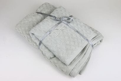 DIOR Beauté
Set includes: two pastel celadon...