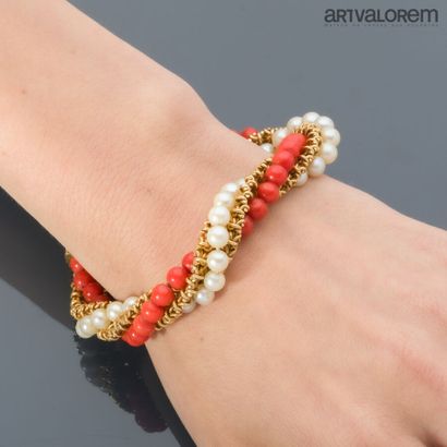 Twisted bracelet in yellow gold 750°/°° composed...