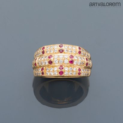 Ring in yellow gold 750°/°° formed of three...