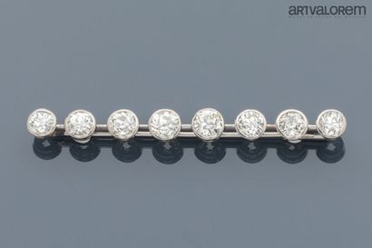 Barrette brooch in platinum set with eight...